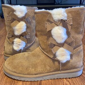 Brown mid height Ugg boots